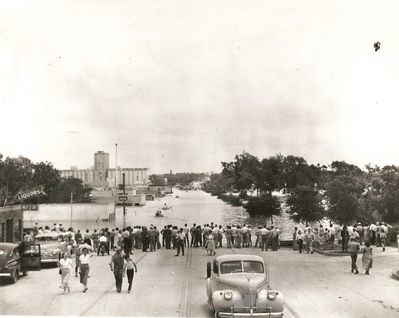 Fort Worth Flood Lancaster Ave looking east 1949
Lancaster Av. looking east. It looks like cars are stopped and turning around on the Trinity River bridge (1938-39) in the background. The grain elevator was just north of the street. The Stayton is sitting on part of the elevator site.
