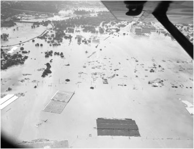 Aerial View of Flood in Fort Worth 1949
Aerial photograph of flood waters in Fort Worth on May 17, 1949. The Montgomery Wards building is seen on the upper right. Many roads and buildings are under water.

Aerial View of Flood in Fort Worth in 1949, Photograph, May 17, 1949; digital image, (http://texashistory.unt.edu/ark:/67531/metapth40670/ : accessed June 19, 2013), University of North Texas Libraries, The Portal to Texas History, http://texashistory.unt.edu; crediting Lockheed Martin Aeronautics Company, Fort Worth, Texas.
