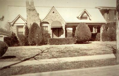 2304 Edwin St., circa 1930
Photo courtesy of Tom and Eileen Richey. If you look closely at the bush in front of the chimney, you can see Bess Rector, who built the house in 1929. The Richeys received the photos from Bess Rector's son, Howard. The Richeys also have the original blueprints and builder's specs. Tom Richey says he has "compiled a history of ownership of the house over the years but nobody rich and famous ever lived here."
