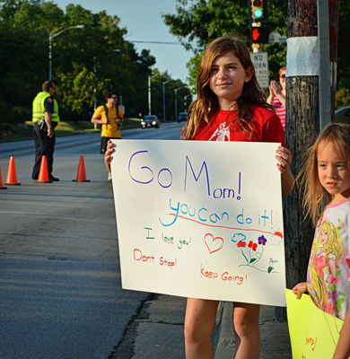 Cheering on Mom, Mistletoe Heights cheer station, July 7, 2013
Photo by Jim Peipert
