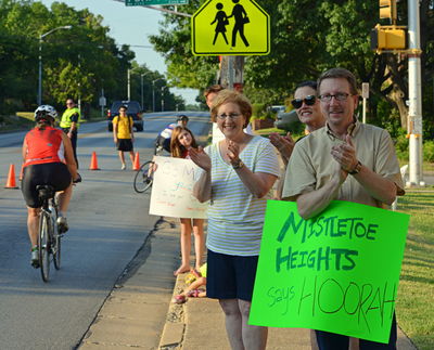 Cheering the cyclists in the Mayor's Triathlon, Mistletoe Heights cheer station, July 7, 2013
Photo by Jim Peipert
