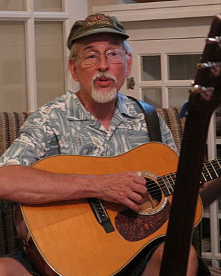 Music Night at the home of Jeff Gibbons on Harrison Avenue, July 4, 2013
Jeff Gibbons at the guitar. Photo by Jim Peipert
