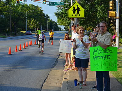 Ellen Rubinson, Denise Neely and Martin Herring at the Mistletoe Heights cheer station for the Mayor's Triathlon, July 7, 2013
Photo by Jim Peipert
